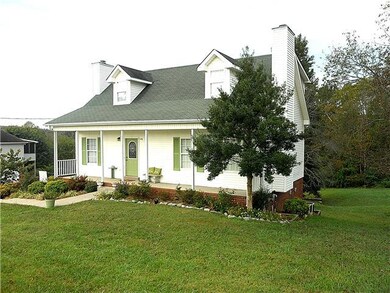 This lovely 2000 built cape home is on an acre lot.