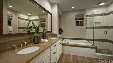 Luxurious master bath with dual sinks, large walk 