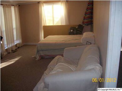 Living area with queen size bed