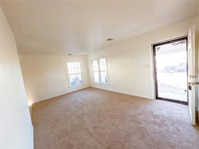 Spare room with carpet floors