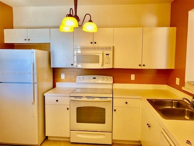 1165 Golden Lakes Blvd unit 1226, West Palm Beach, FL 33411 - photo 2