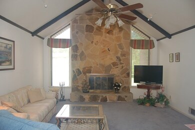 Living Room w/ Stone Fireplace