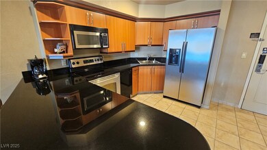 Kitchen featuring appliances with stainless steel