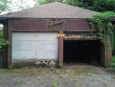 2 car garage.  Like the house needs work. Brick st