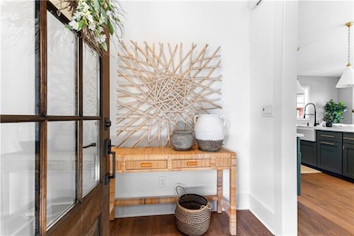 Interior details featuring wood finished floors, b