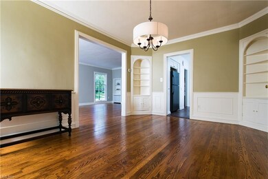The pretty Formal Dining Room features built-in ca