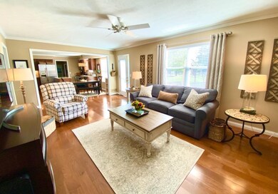 Family room is a warm inviting space that transitions naturally to the kitchen.