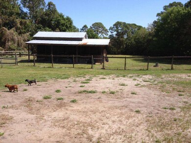 Fenced Backyard with Pole Barn