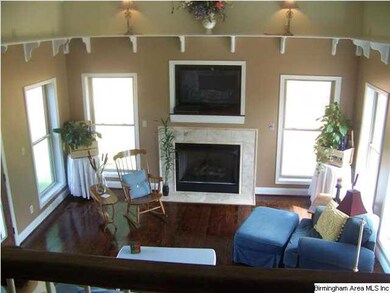 Over looking the Family Room from staircase in foy