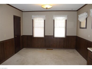 The dinette is carpeted and has a pantry.