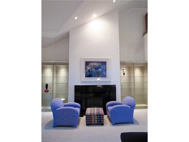 The great room offer a gas fireplace and custom gl