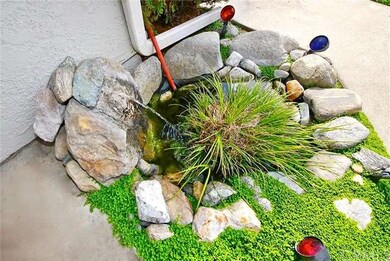 Water feature at entryway to bring good fortune!