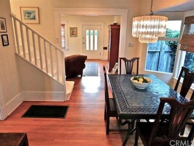 Living room leads to sun filled dining room