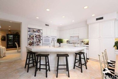 Large island in the kitchen is ready for family ge