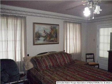 Downstairs master with access to porch.