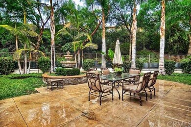 This very private yard backs to a hill, lined with