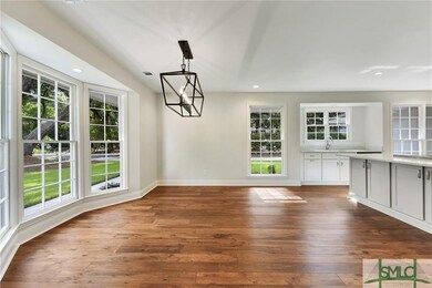 Large Dining Area opened up to Kitchen