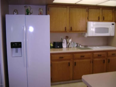 Newer refrigerator in kitchen
