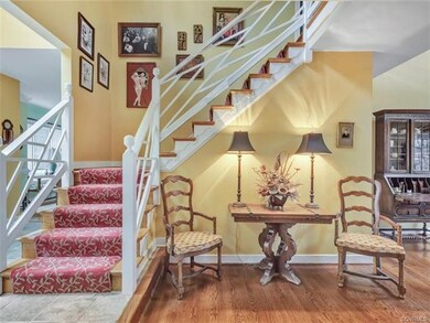 Slate stone foyer with coat closet and chippendale