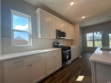 Kitchen featuring appliances with stainless steel 