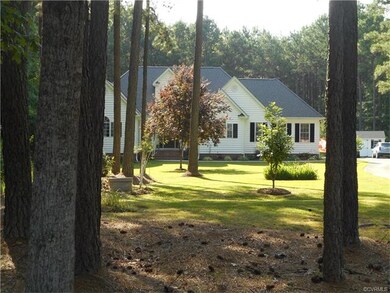 House sits off road w/lovely landscaped yard and p