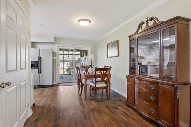 Dining area and door to left is a large laundry cl