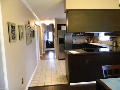 View from Dining Room into Kitchen & hallway to la