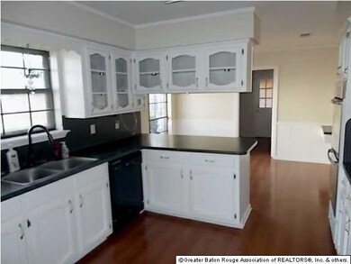 Kitchen is large and bright