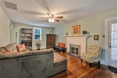 Hardwoods, fireplace, replacement windows