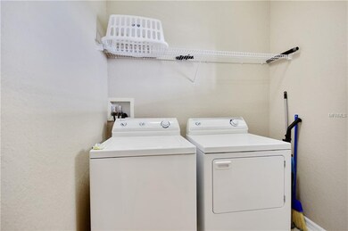 Spacious laundry room as you enter the home.