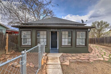 Bungalow-style house with fence private yard and a