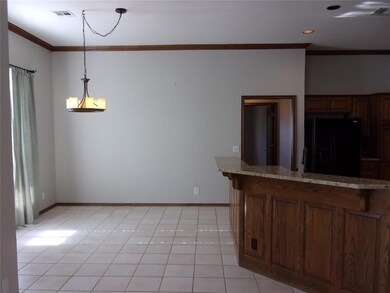 Nice formal dining area w  light tile flooring & u