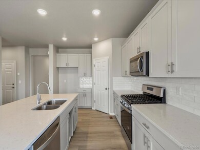 9102 Quintero St, Commerce City, CO 80022 - photo 6