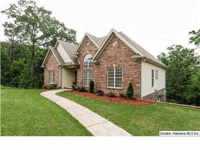 Beautifully landscaped & manicured! Poured concret