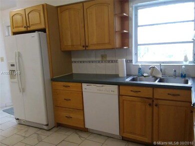 Large window providing natural light, also door le