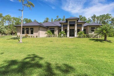 4987 Mahogany Ridge Dr, Naples, FL 34119 - photo 2