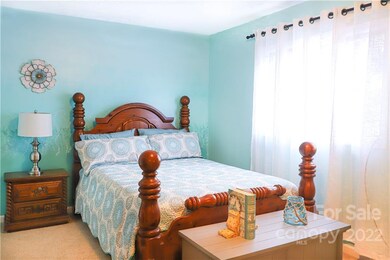 Bedroom closest to front door. Walk in closet in this bedroom.