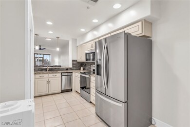 Kitchen featuring appliances with stainless steel