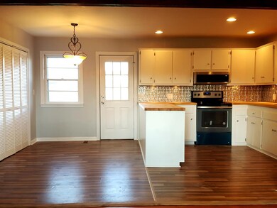 View from Living Room.  Open Concept Living, Kitchen, and Dining Area.