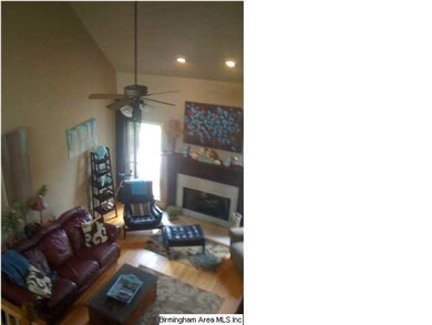 Soaring ceilings and gleaming hardwoods!