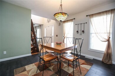 Natural light pours in through the front windows, 