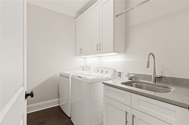 Laundry room with sink