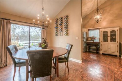 Hand-scraped hardwood floors throughout...