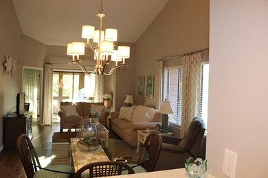Another view of great room with lots of natural li
