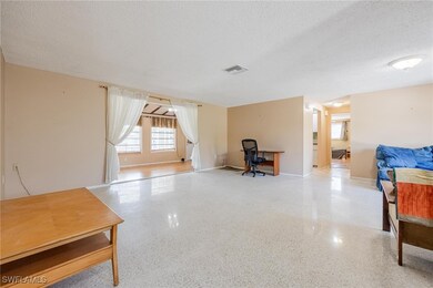 Living room with a textured ceiling