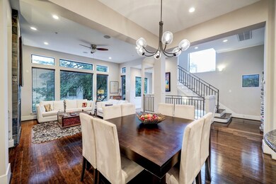 Relax and entertain under 11-foot-tall ceilings on