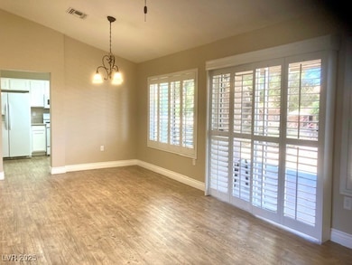 Dining room/ Living room area - vaulted ceiling, w