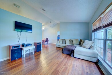 living room with cathedral ceiling