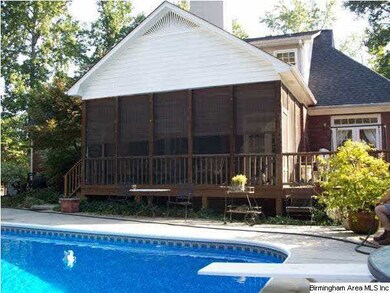 Screened deck with open deck off kitchen to the ri