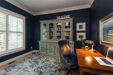 Downstairs office or study with french doors and p